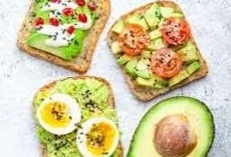 Avocado toast with egg and tomatoes
