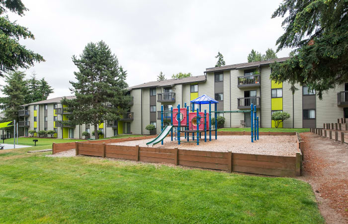 On-site playground adjacent to the outdoor BBQ area at The Union in Federal Way