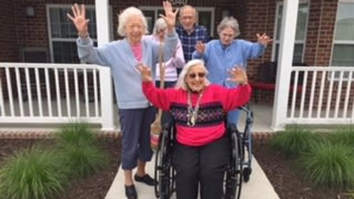 Residents having a good time at a senior living facility