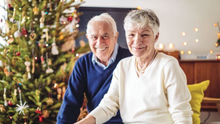 A couple enjoying Christmas at Meridian Senior Living.