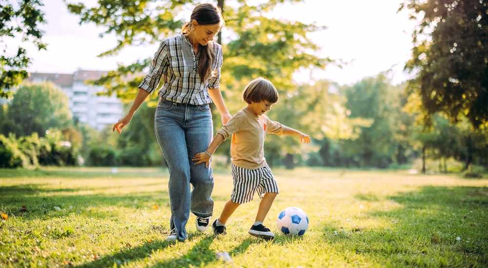 Resident family playing park near The Depot at North Salem in Apex, North Carolina
