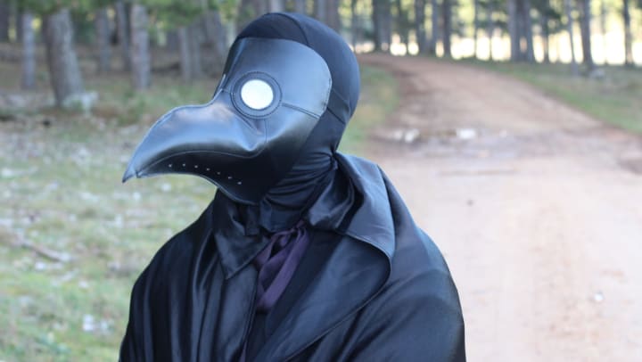 Plague doctor mask for blog post for Olympus on Main in Carrollton, Texas