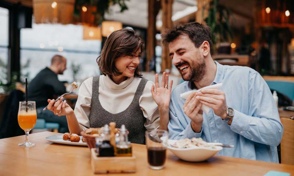 Residents enjoying food in their favorite restaurant near Eden Tower Apartments in Reno, Nevada
