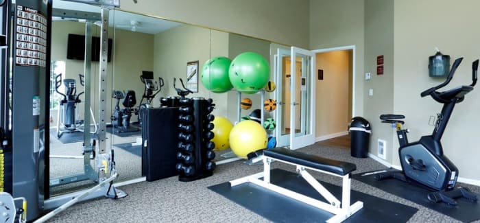 Our on-site fitness center makes staying fit easy at Discovery Landing Apartment Homes in Burien, WA