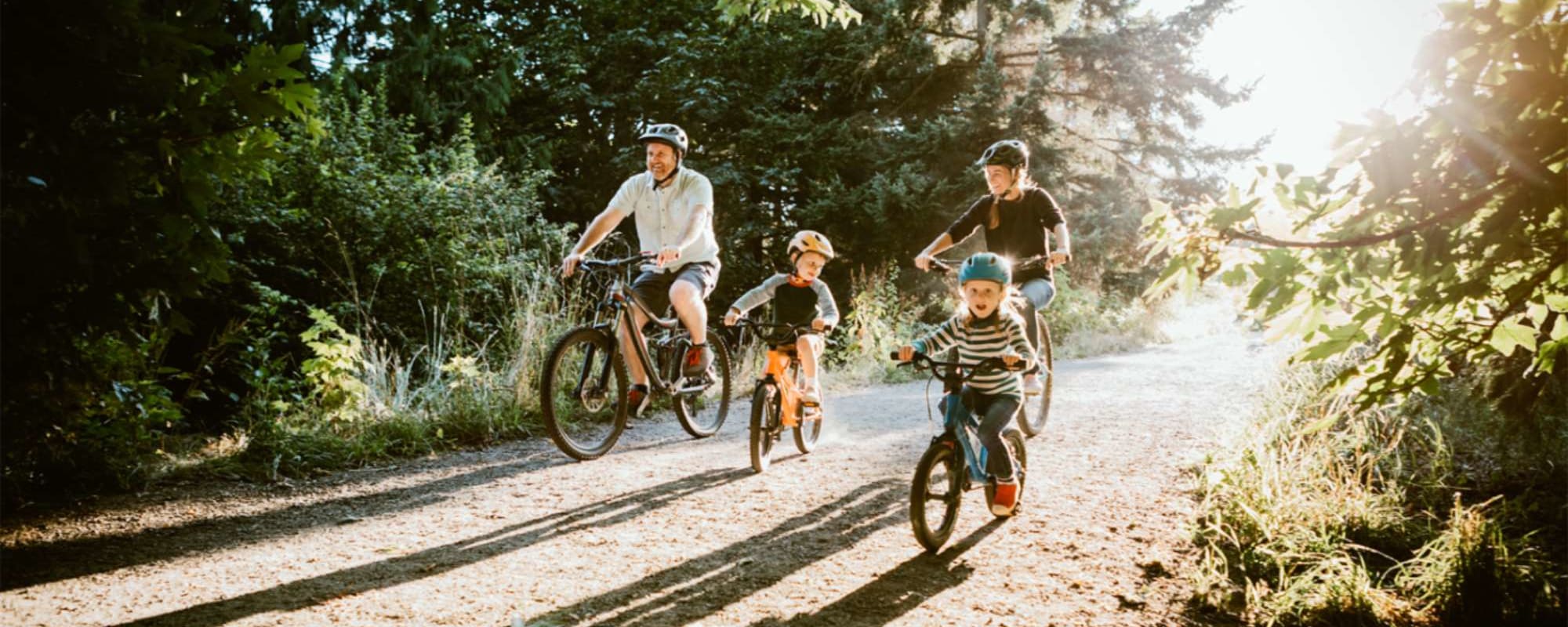 Family rides down the trail near The Gates in Houston, Texas