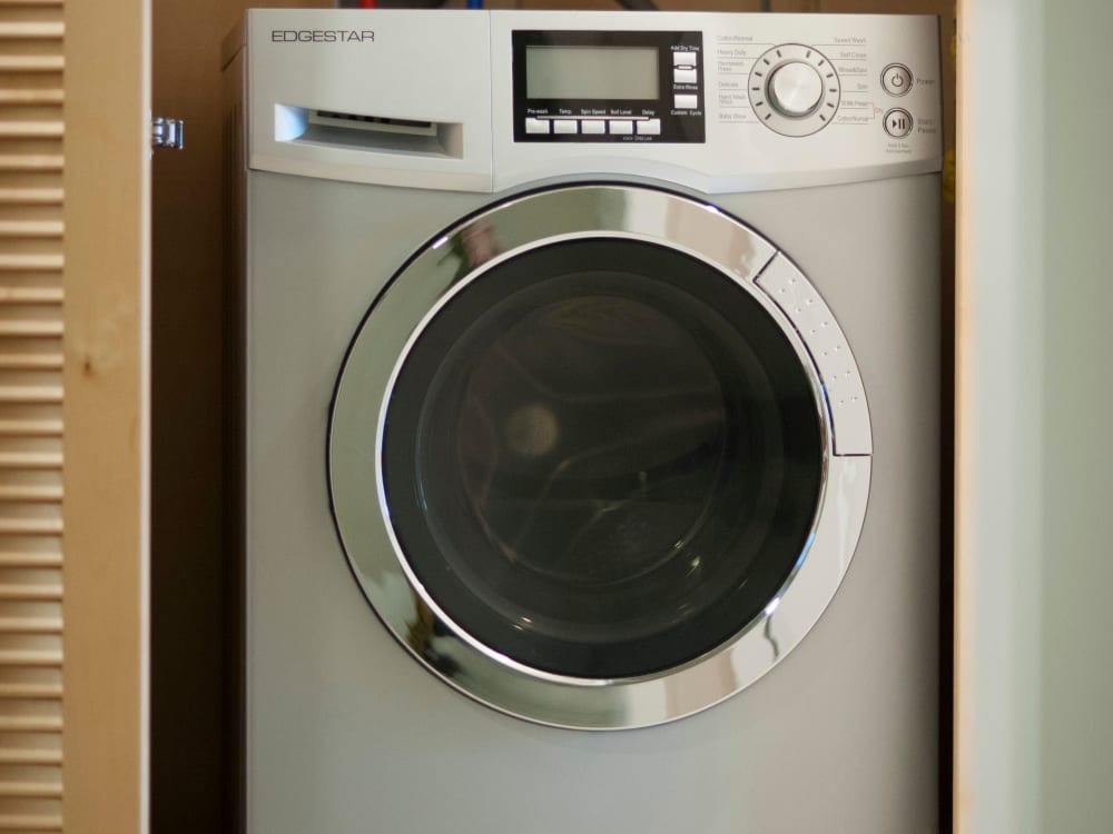 Energy-efficient washer/dryer in a model apartment at Brooklyn Yard in Portland, Oregon