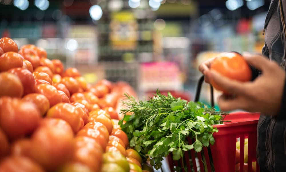 Resident doing some produce shopping at a market near Parkwood in Lancaster, California