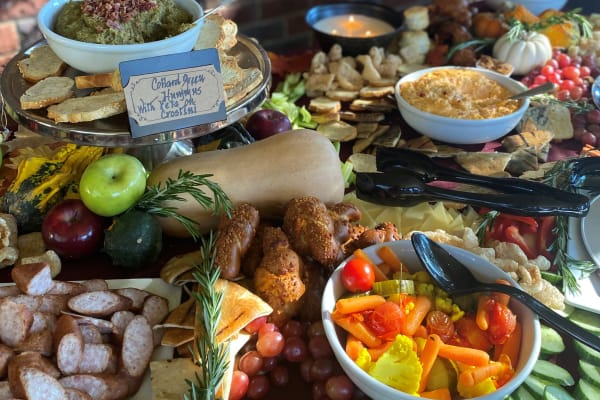 buffet table with meats, cheeses, vegetables, nuts and fruit at The Foothills Retirement Community in Easley, South Carolina