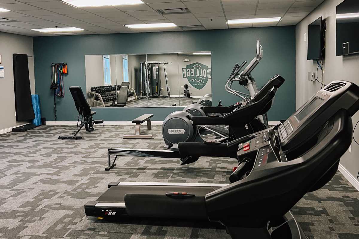 Fitness center with cardio equipment at College Town Mankato in Mankato, Minnesota