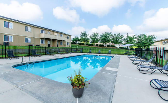 Large swimming pool with a sundeck at Wexford Apartment Homes in Charlotte, North Carolina