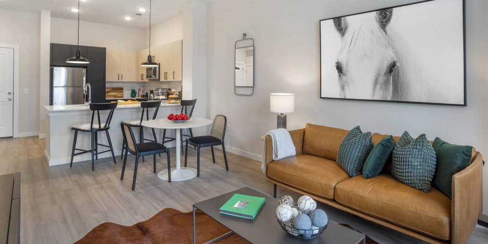 Well-lit living room at The Oliver in Charlotte, North Carolina