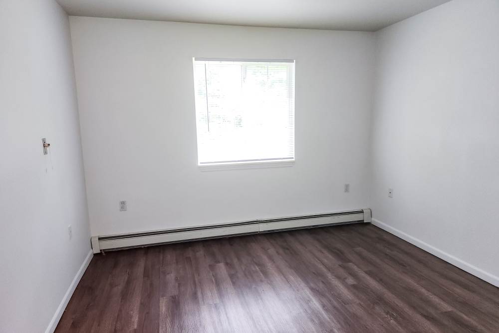 Unfurnished bedroom at Woodbrook Apartments in Three Rivers, Michigan