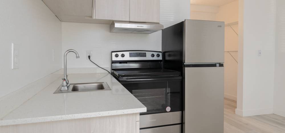 Modern Stainless Steel appliances in Kitchen at Cascade Ridge in Tacoma, Washington
