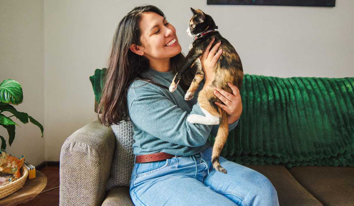 Resident woman with her cat at The Heights at Waterpointe in Flowood, Mississippi