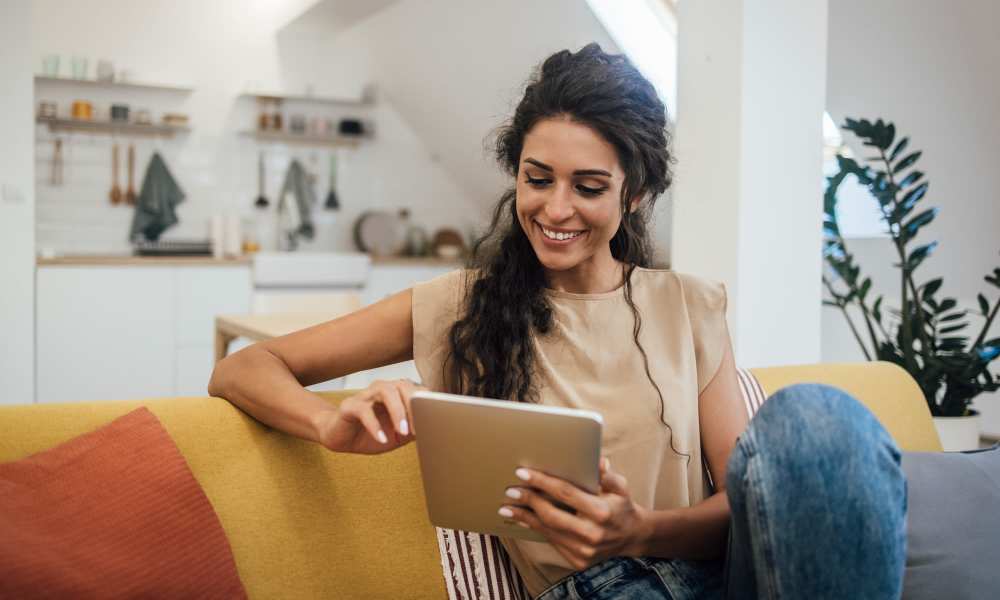Resident reading the tab at RiverWatch Apartments in Elkridge, Maryland