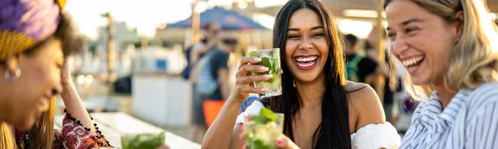 Friends out for drinks on a sunny patio near Octave in Davis, California
