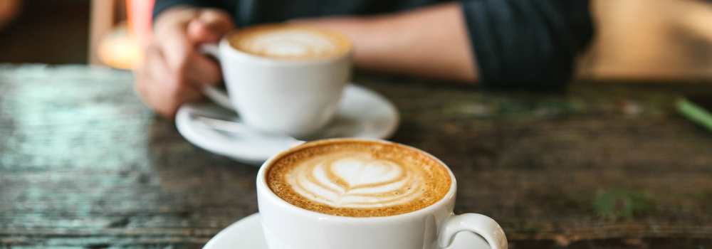 Resident having coffee at Malibu in Tucson, Arizona