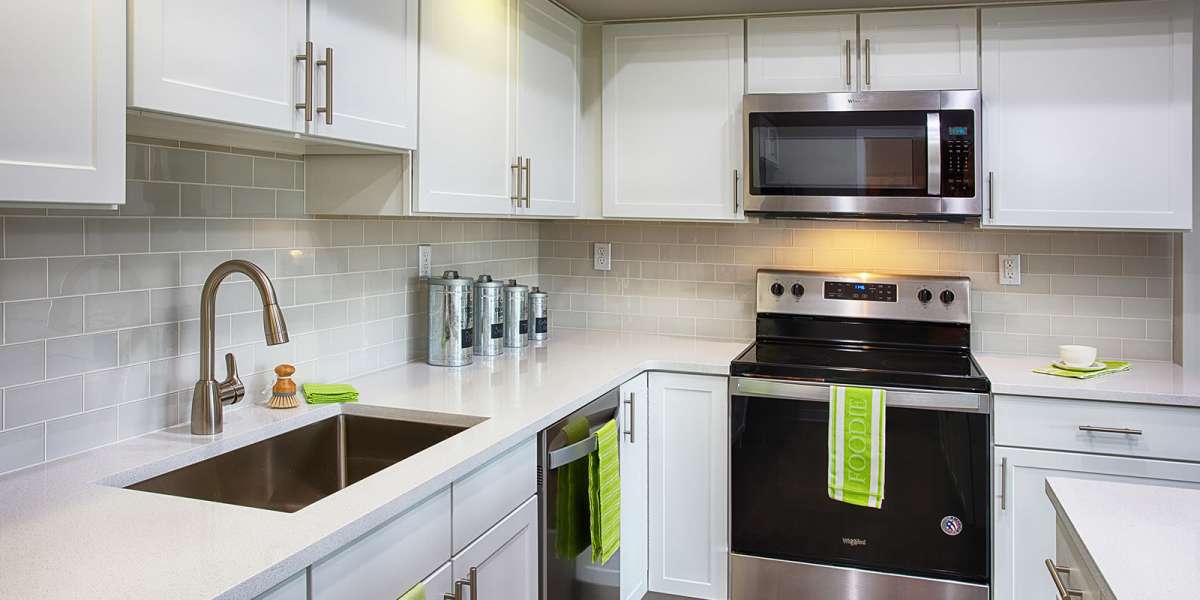 Kitchen with stainless-steel appliances at The Greens at Van de Water in Loveland, Colorado