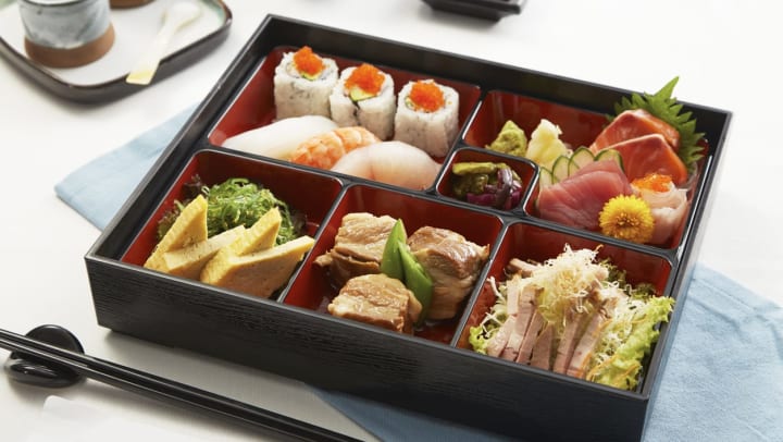 bento box with sushi and vegetables | Bento Boxes in Charlotte