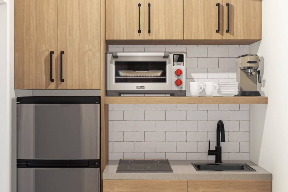 Modern kitchen with wooden cabinets at Bellevue Ridge Apartments in Bellevue, Washington  
