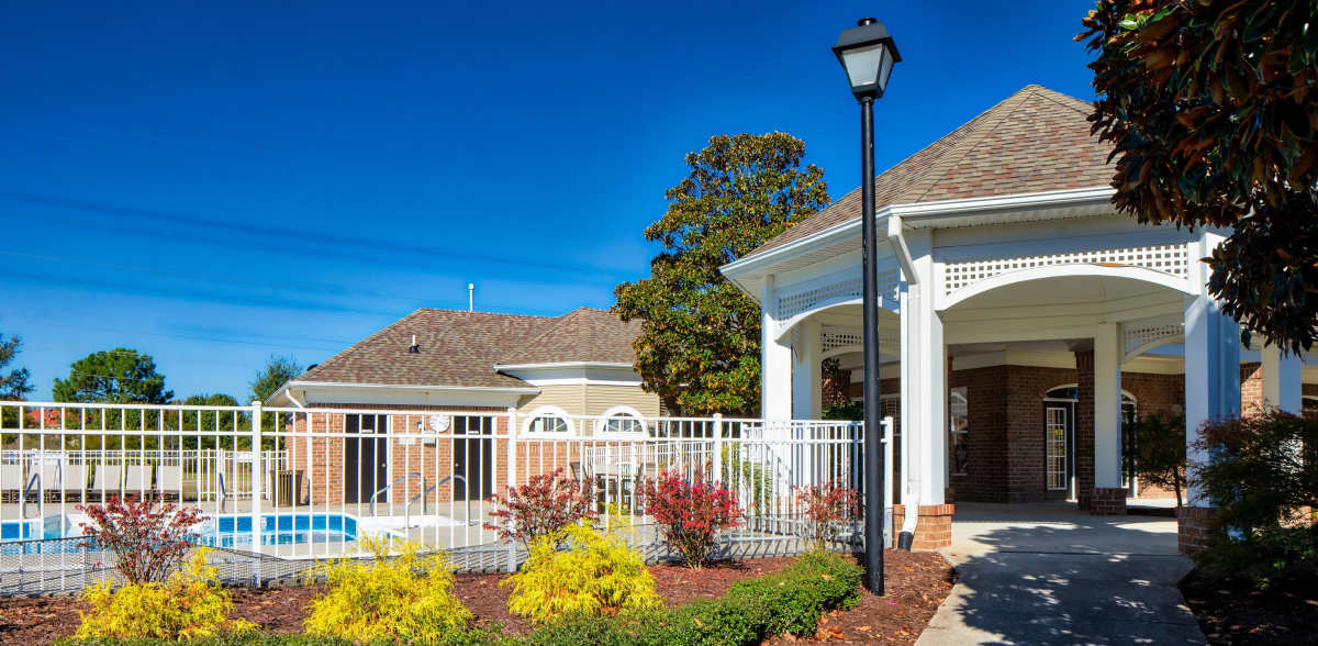 Landscaped grounds and sparkling pool at Magnolia Chase, Virginia Beach, Virginia