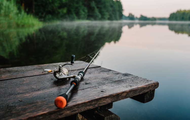 Fishing pole on a dock at American Legion Park near The Establishment at 1800 in Missouri City, Texas