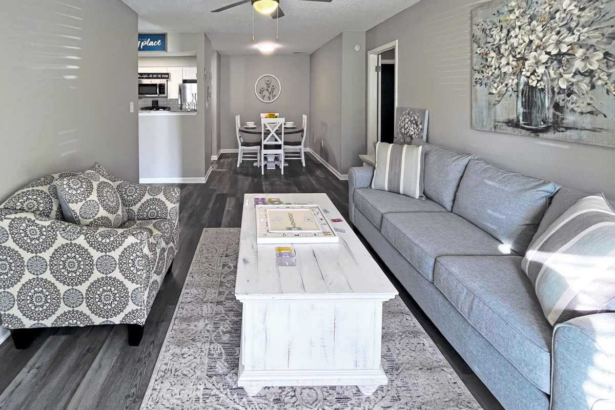 Living room and dining area at Trinity Lakes in Cordova, Tennessee