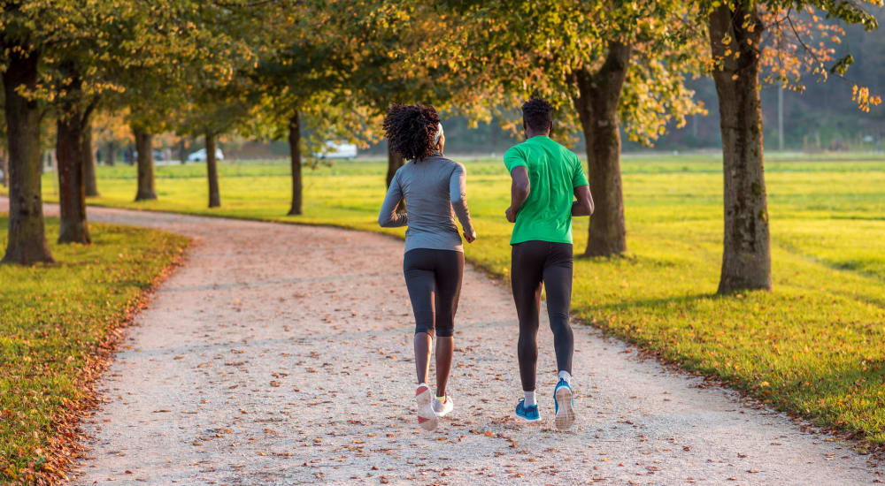Residents jogging a path near Cumberland Pointe in Noblesville, Indiana