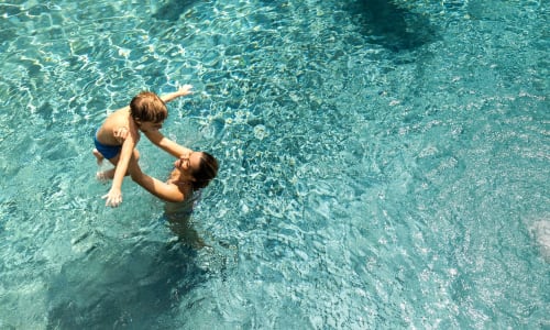 Playing in the pool at Pennsylvania Apartments in Fremont, California