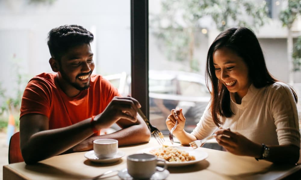 Friends out at a cafe near Catalina Crest Apartment Homes in Livermore, California