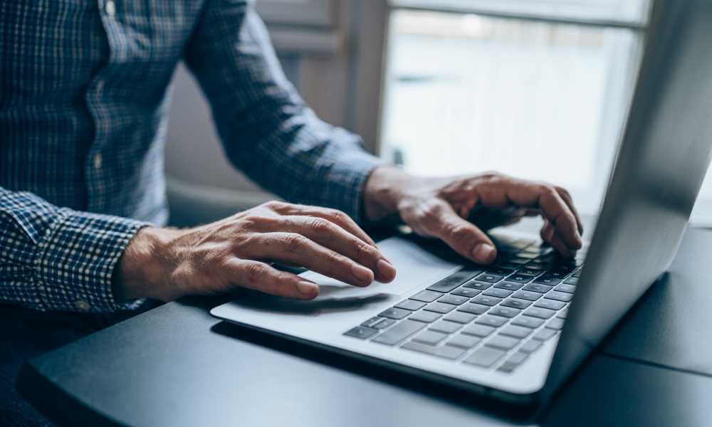 Resident using online service at Ellicott Gardens in Ellicott City, Maryland 