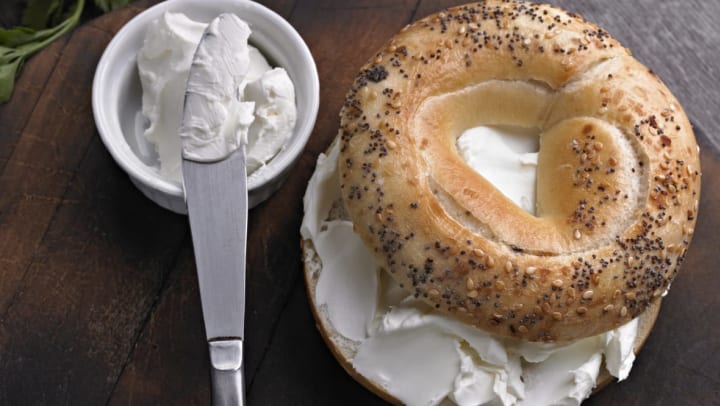 keto everything bagel with cream cheese on a wooden serving tray | gluten-free takeout in Katy
