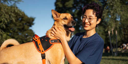 Resident taking her dog at a park near The Washburn in Memphis, Tennessee