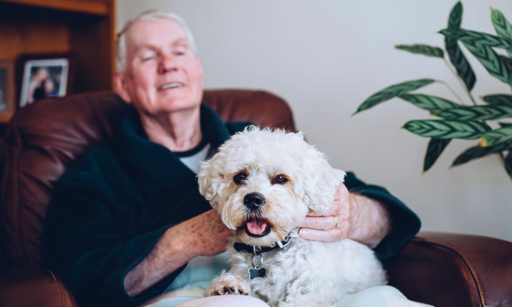 A resident and his dog at Patriots Landing in DuPont, Washington. 