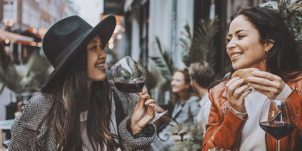 Women drinking wine near Indigo Champions Ridge in Davenport, Florida