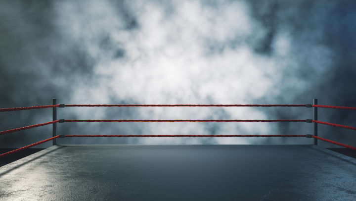 Wrestling/boxing ring surrounded by fog. 