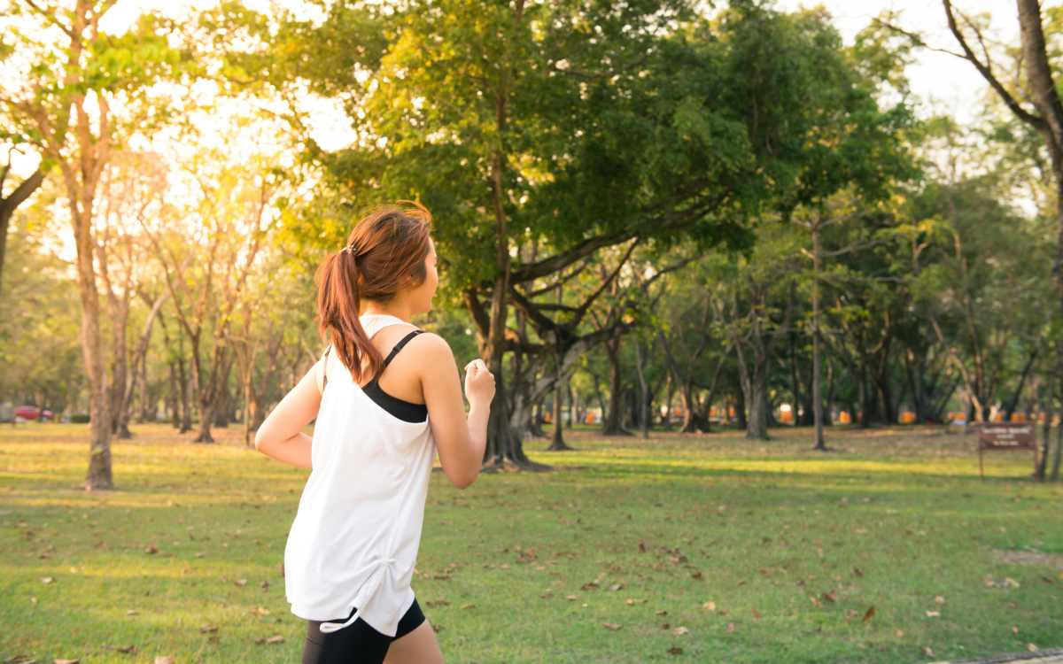 Resident jogging in park near Camellia in Raleigh, North Carolina