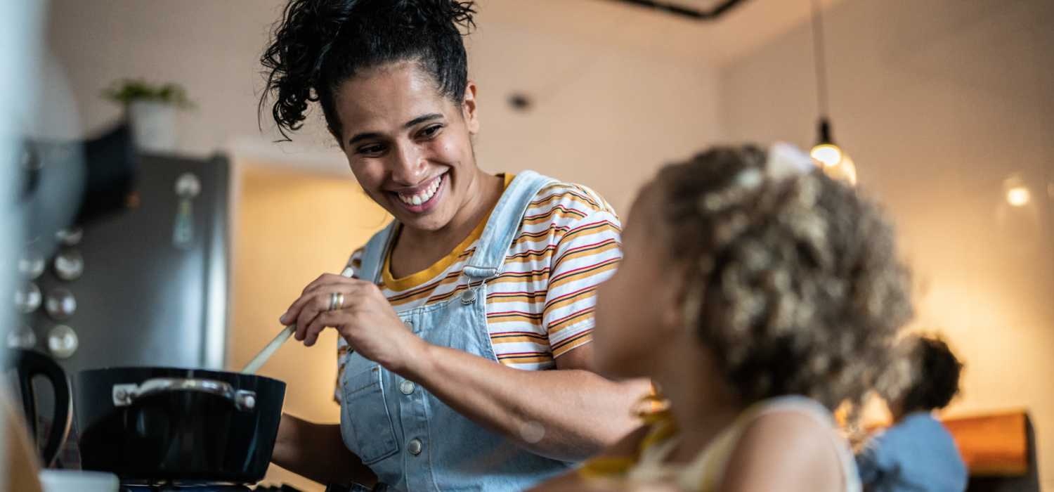 Mother and daughter in kitchen at Yale Apartments in Yale, Michigan