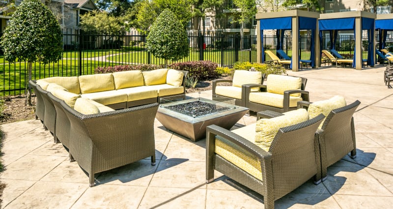 A beautiful back patio with comfortable seating at The Fuse at Park Row in Houston, Texas