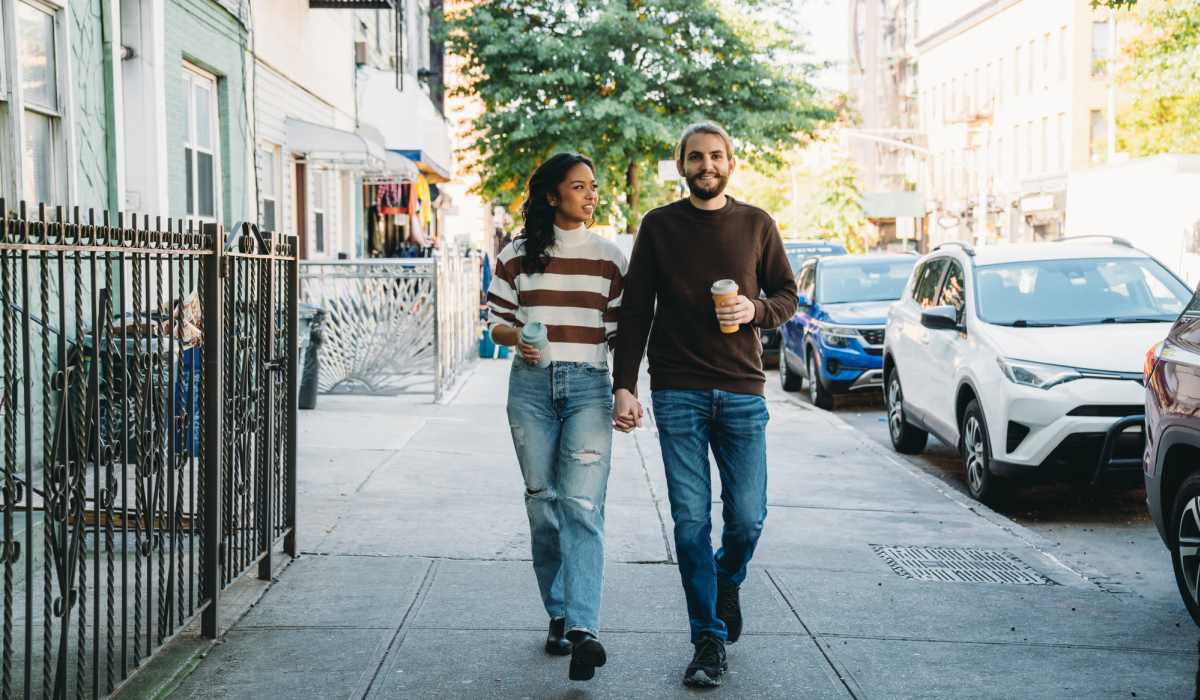Resident couple exploring the neighborhood at Granada Gardens Apartments in Warrensville Heights, Ohio