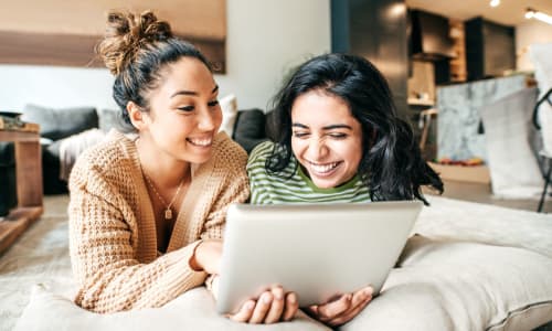 Residents looking at a tablet at Broadway Towers in Concord, California