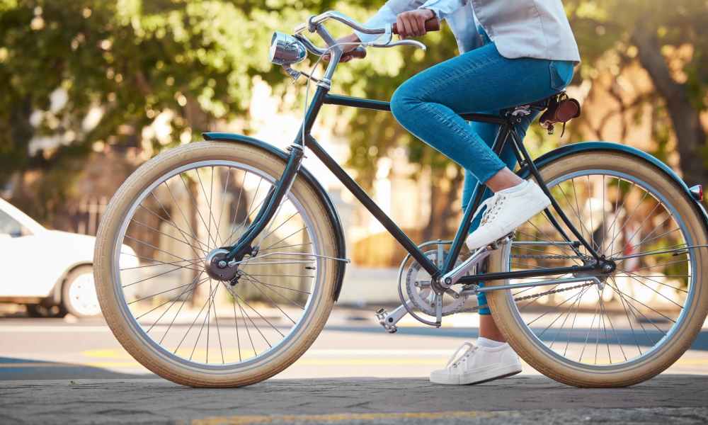 Residents biking near The Den in Columbia, Missouri