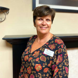 Barb Muench, Assistant Director