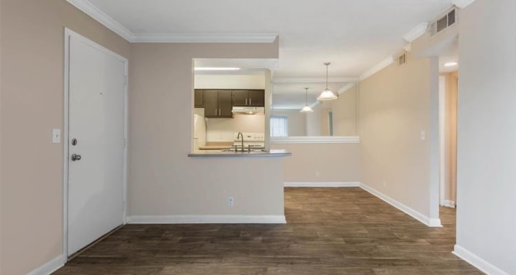 Open-floor concept with wood-style flooring at The Hamilton in Hendersonville, Tennessee