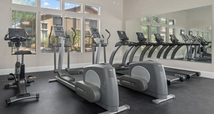 Resident getting in shape in the fitness center at Sierra Verde in Surprise, Arizona