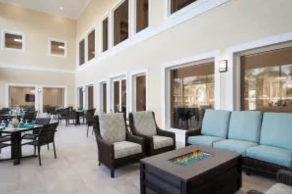 Common seating area at The Pineapple House at Sapphire Lakes in Naples, Florida