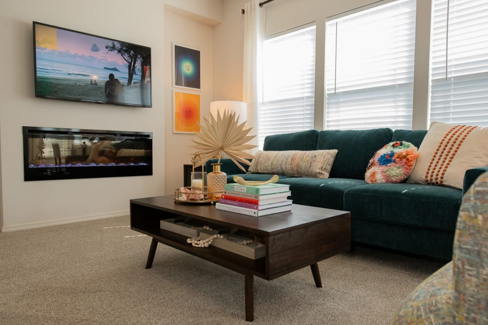 Living room with LED fireplace at Artisan Crossing in Norman, Oklahoma