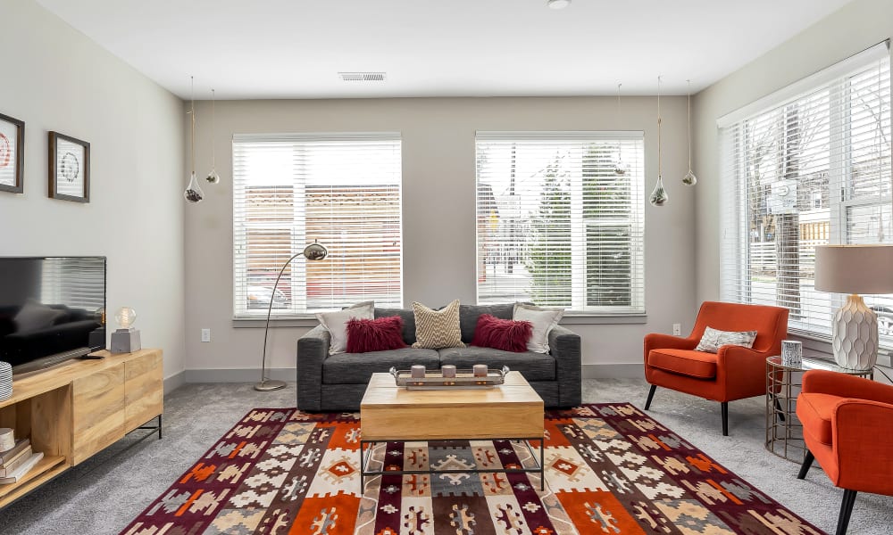 Carpeted living room at Gantry Apartments in Cincinnati, Ohio