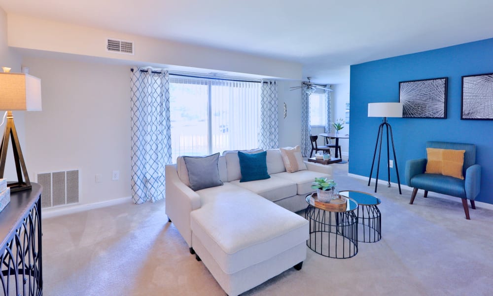 Naturally well lit living room at Gwynn Oaks Landing Apartments & Townhomes, MD