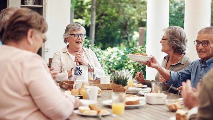Residents eating snacks together
